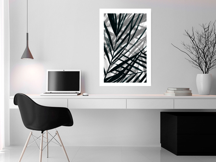 Poster In the Shade of Leaves - black and white leaves casting shadows on a white wall 122628 additionalImage 2