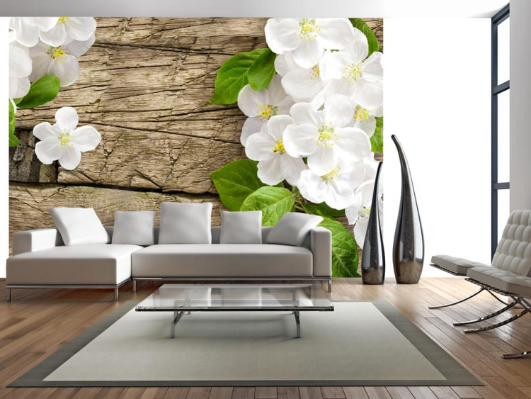 Wall Mural Nature - Raw Wood surrounded by White Flowers with Green Leaves 60728