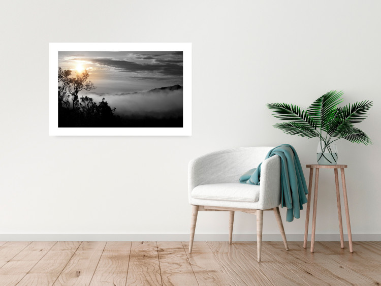 Poster Sunrise - dark landscape of trees against clouds and dense fog 117258 additionalImage 4