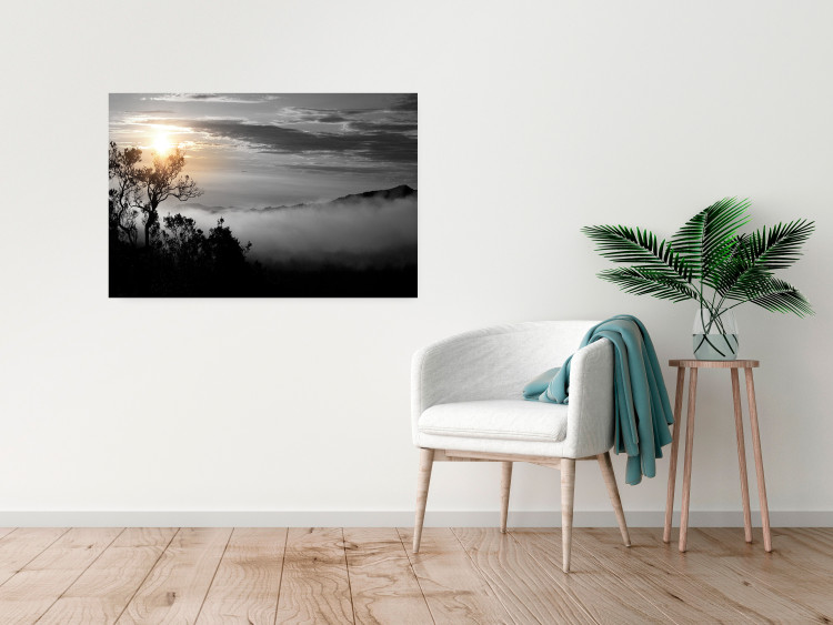 Poster Sunrise - dark landscape of trees against clouds and dense fog 117258 additionalImage 17