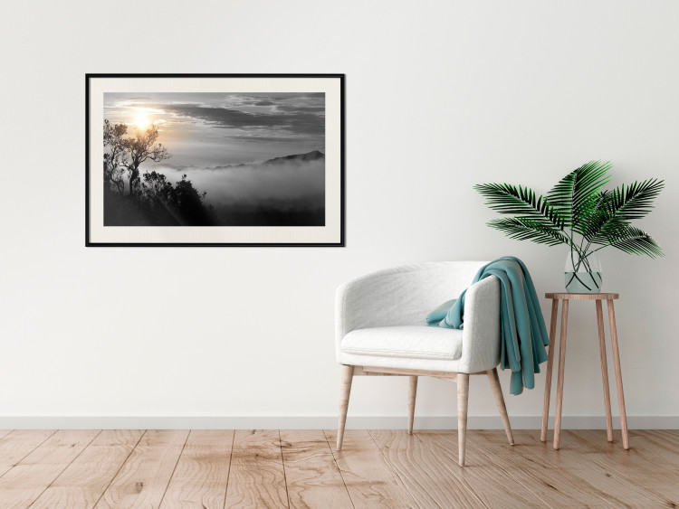 Poster Sunrise - dark landscape of trees against clouds and dense fog 117258 additionalImage 22