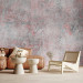 Wall Mural Mosaic - fragments of pink ornaments on a background of concrete texture 143768