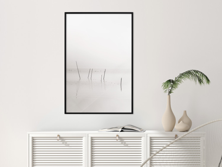Poster Misty Trail - landscape of sticks protruding from the water on a white background 130378 additionalImage 6