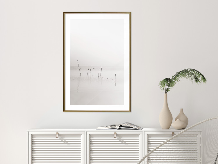 Poster Misty Trail - landscape of sticks protruding from the water on a white background 130378 additionalImage 13
