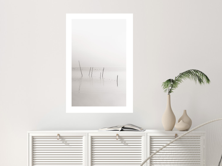 Poster Misty Trail - landscape of sticks protruding from the water on a white background 130378 additionalImage 3
