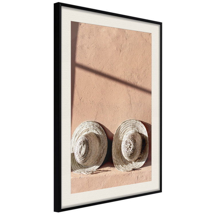 Wall Poster Sunlit Couple - two hats in the sunlight against a wall 129509 additionalImage 2