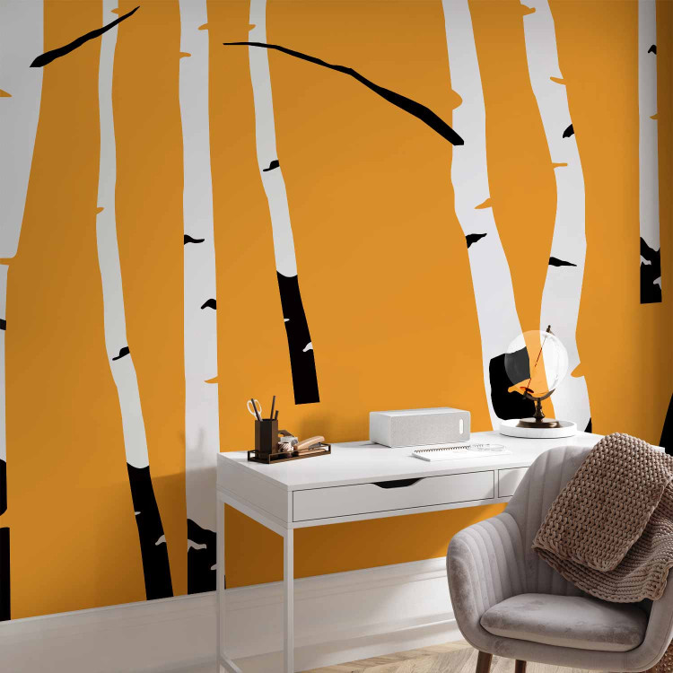 Wall Mural Birch forest - black and white tree trunks on an orange coloured background 96609 additionalImage 4