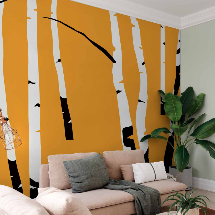 Wall Mural Birch forest - black and white tree trunks on an orange coloured background 96609