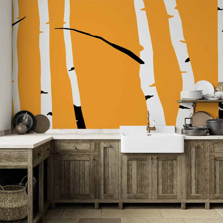 Wall Mural Birch forest - black and white tree trunks on an orange coloured background 96609 additionalImage 6