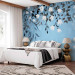 Wall Mural Blue energy - landscape with a loose composition of leaves and white flowers 143519 additionalThumb 2