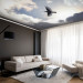 Wall Mural Flying Bird - Flight Against the Sky With Clouds and Sunshine 159919