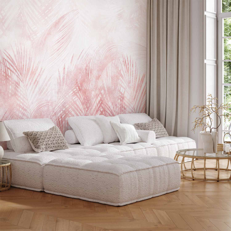 Wall Mural Relaxed plants - interspersed palm leaves in a pink shade 144639