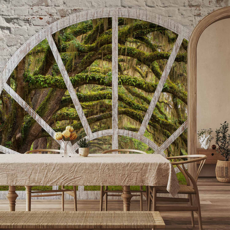 Wall Mural View from the window of nature - landscape of a green forest and a tree covered with moss 62449 additionalImage 4