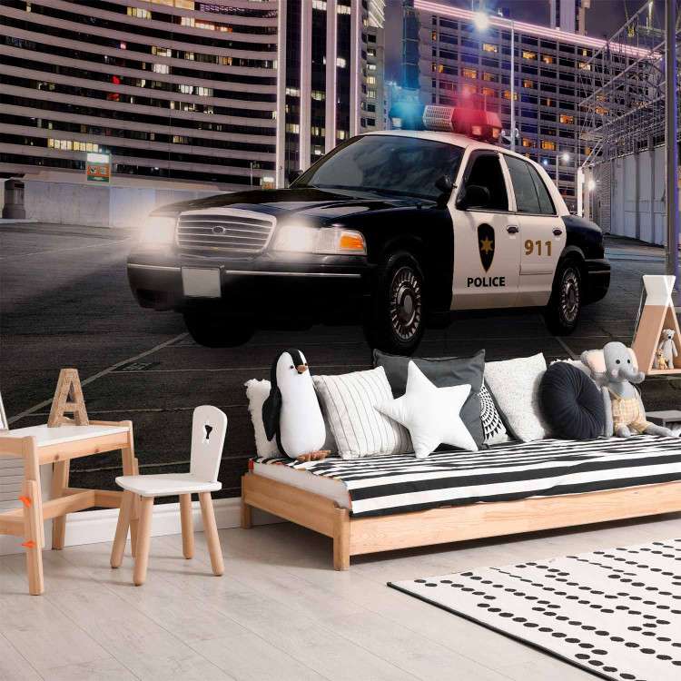 Wall Mural Police car at night - police car motif on a background of city architecture 97049 additionalImage 4