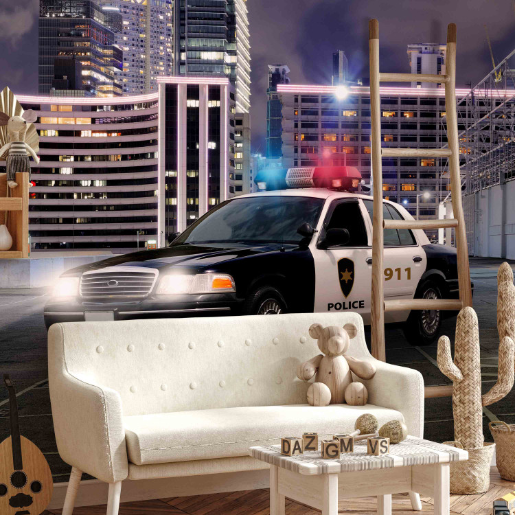 Wall Mural Police car at night - police car motif on a background of city architecture 97049 additionalImage 5