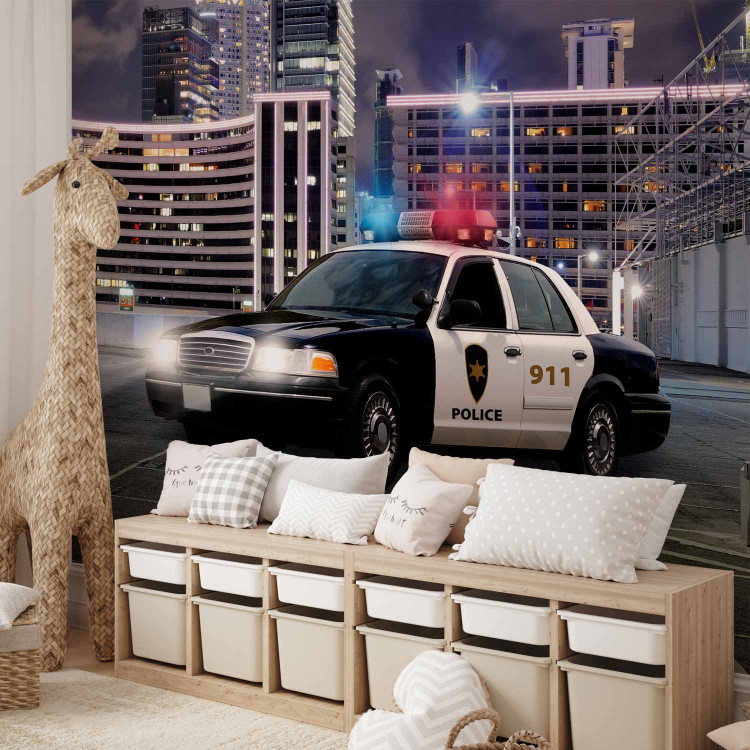 Wall Mural Police car at night - police car motif on a background of city architecture 97049 additionalImage 8