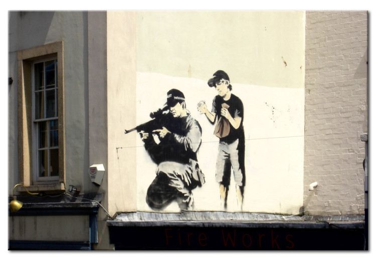Canvas Print Behind the enemy's back - graffiti a'la Banksy with a boy and a sniper 58959