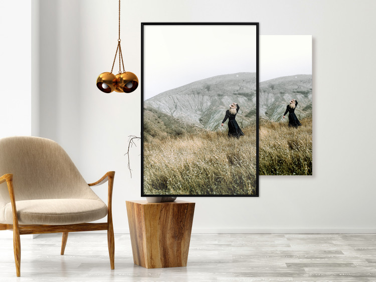 Poster Lost in Nature - landscape of a meadow with a woman against a mountain range 130279 additionalImage 6