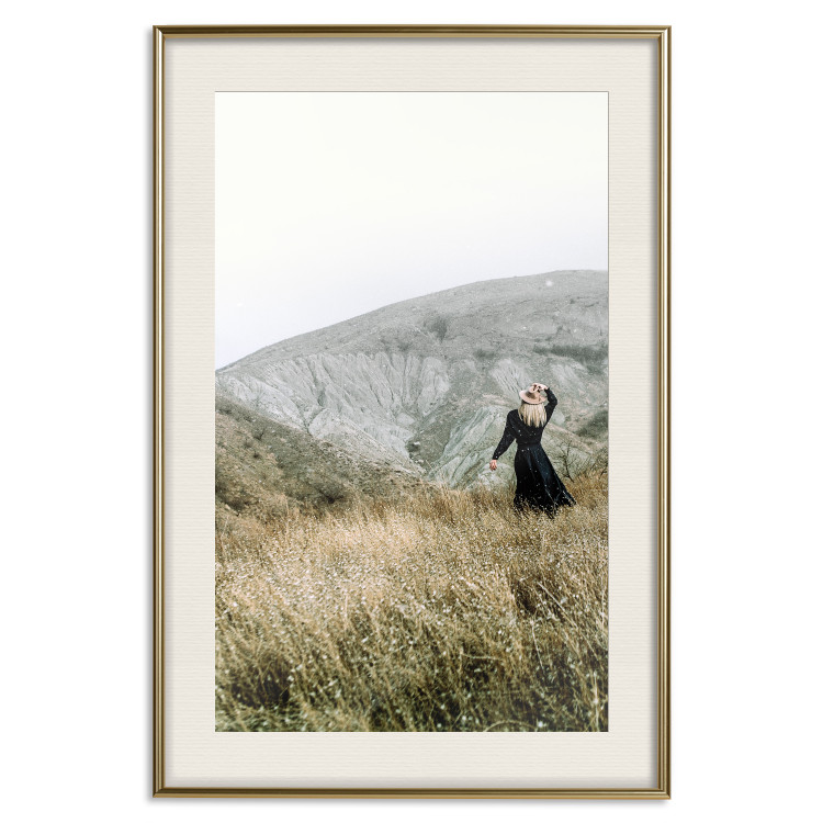 Poster Lost in Nature - landscape of a meadow with a woman against a mountain range 130279 additionalImage 20