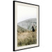 Poster Lost in Nature - landscape of a meadow with a woman against a mountain range 130279 additionalThumb 2