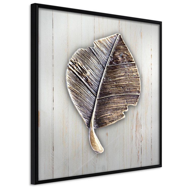 Poster Enchanted in Gold - autumn abstraction with a leaf on a light wood background 118789 additionalImage 12