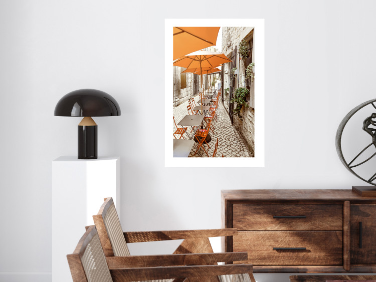Poster Summer Morning - restaurant tables and street in an Italian town 135889 additionalImage 18