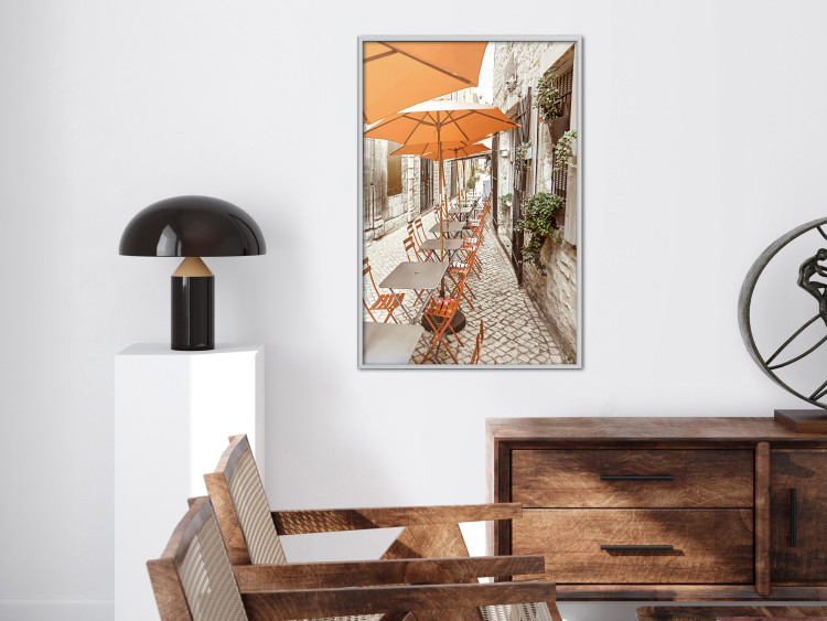 Poster Summer Morning - restaurant tables and street in an Italian town 135889 additionalImage 15