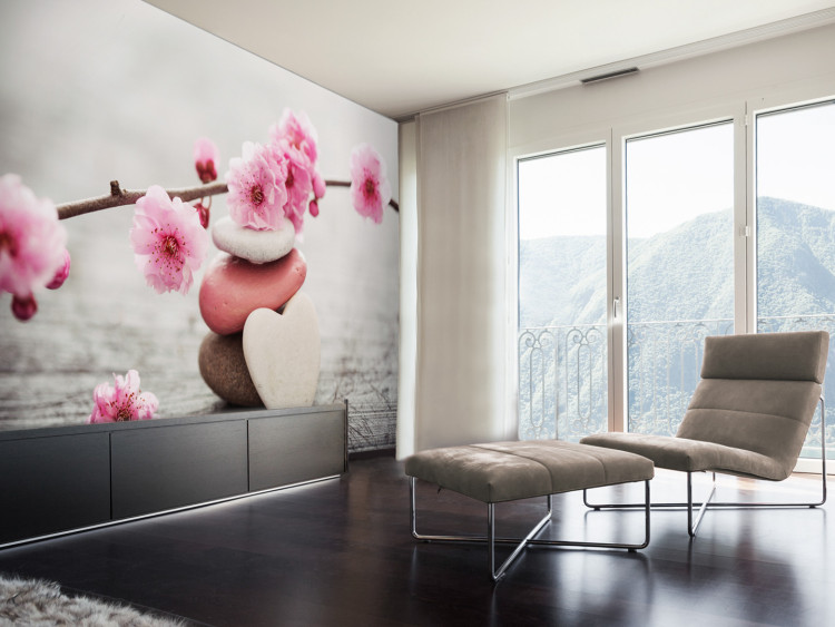 Wall Mural Orient - composition of cherry blossoms with a white heart-shaped stone 96089