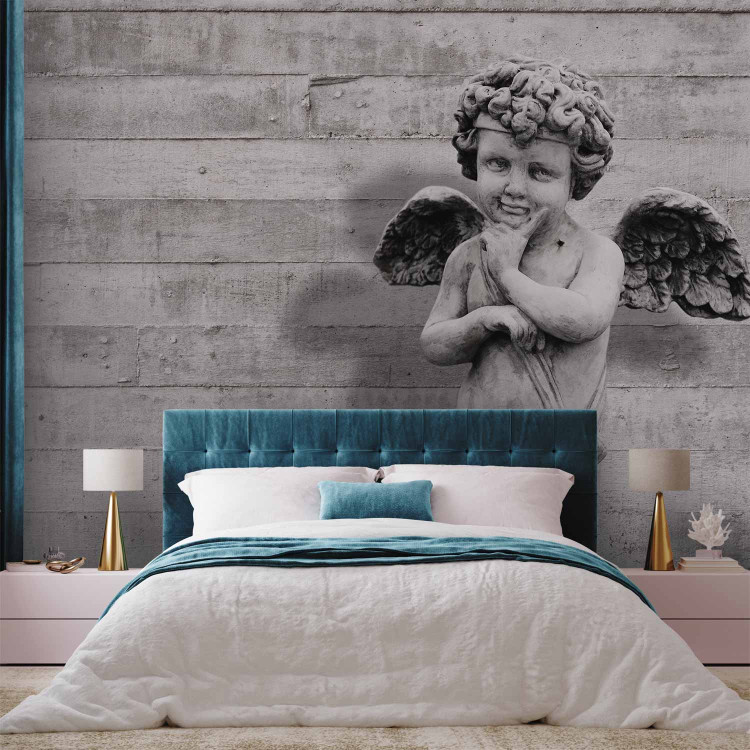 Wall Mural Charming stone cherub - angel sculpture against a background of concrete stripes 64499 additionalImage 2