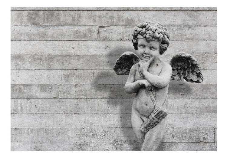 Wall Mural Charming stone cherub - angel sculpture against a background of concrete stripes 64499 additionalImage 1