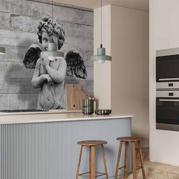 Wall Mural Charming stone cherub - angel sculpture against a background of concrete stripes 64499 additionalImage 7