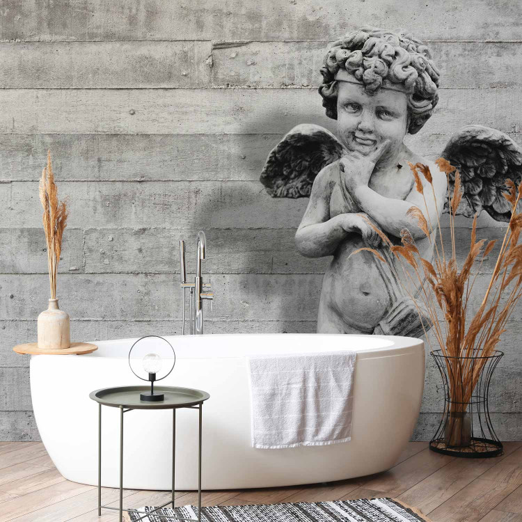 Wall Mural Charming stone cherub - angel sculpture against a background of concrete stripes 64499 additionalImage 8
