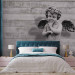 Wall Mural Charming stone cherub - angel sculpture against a background of concrete stripes 64499 additionalThumb 2